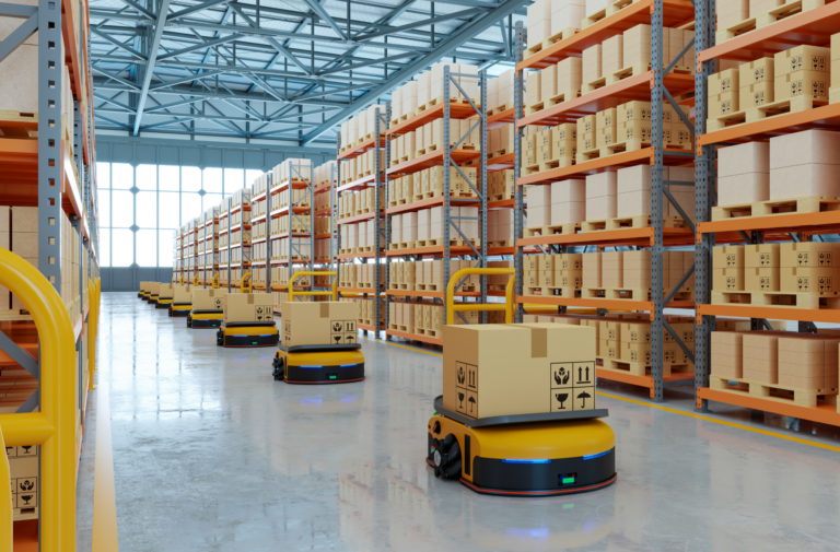 Image illustrant un entrepôt Amazon avec pleins de cartons et de machines robotisés.